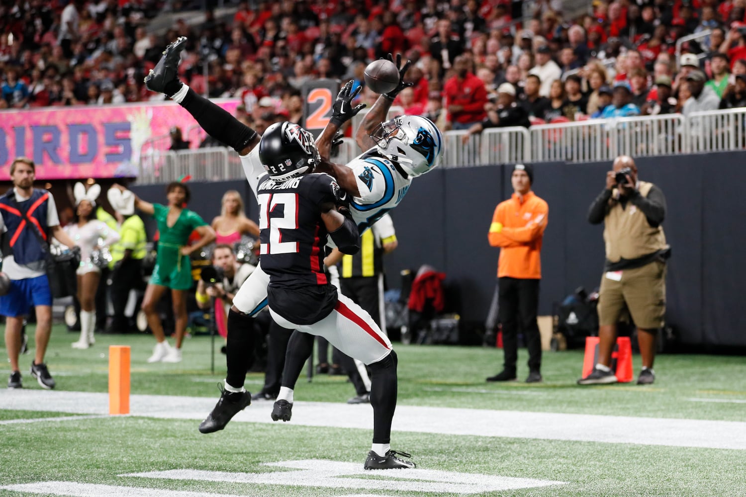 Falcons defensive back Cornell Armstrong deflects the ball from Panthers wide receiver Terrace Marshall during the second quarter Sunday in Atlanta. (Miguel Martinez / miguel.martinezjimenez@ajc.com)