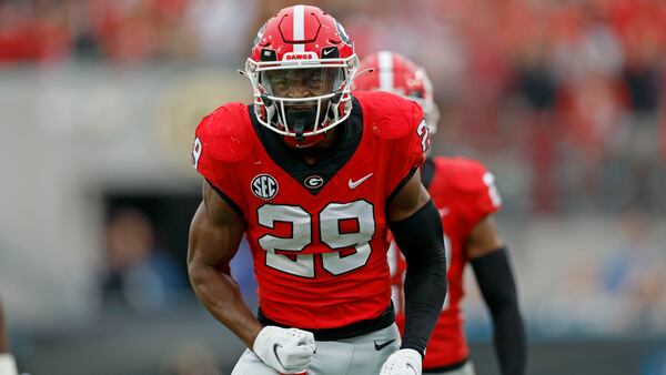 Georgia Bulldogs defensive back Christopher Smith (29) celebrates a tackle during the first half against the Florida Gators in a NCAA football game at TIAA Bank Field, Saturday, October 29, 2022, in Jacksonville, Florida. Georgia won 42-20. (Jason Getz / Jason.Getz@ajc.com)