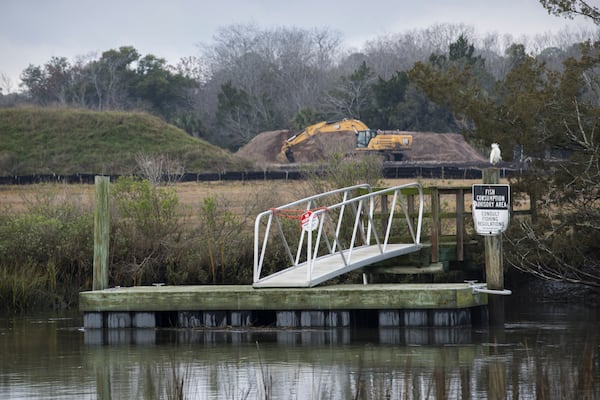 A dock is shown near the Terry Creek Dredge Spoil Areas/Hercules Outfall Superfund Site in Brunswick. The site totals approximately 216 acres located near a residential neighborhood. (Stephen B. Morton for the AJC 2024)