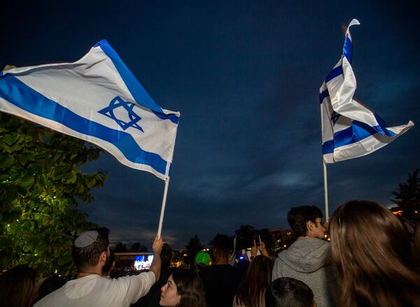 Thousands of Israel supporters gather inside and outside of City Springs in Sandy Spring on Tuesday, Oct 10, 2023 for a rally for Israel.   (Jenni Girtman for The Atlanta Journal-Constitution)