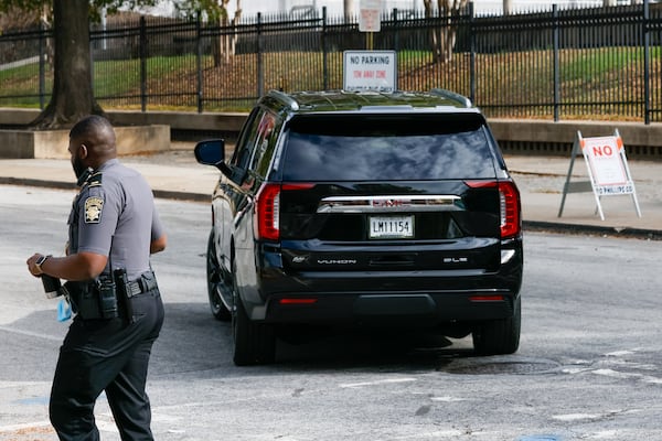 A vehicle leaves the Fulton County Courthouse in Atlanta on Tuesday, November 22, 2022, the day U.S. Sen. Lindsey Graham testified to a special purpose grand jury investigating whether former President Donald Trump or his associates criminally meddled in Georgia’s 2020 elections. (Arvin Temkar / arvin.temkar@ajc.com)