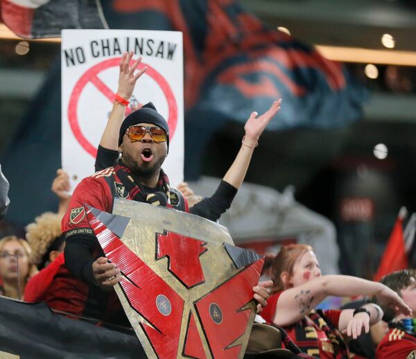 12/8/18 - Atlanta -  Fans cheer on their team during warmups.  The Atlanta United soccer team plays the Portland Timbers for the MLS Cup, the championship game of the Major League Soccer League at Mercedes-Benz Stadium in Atlanta.  BOB ANDRES / BANDRES@AJC.COM