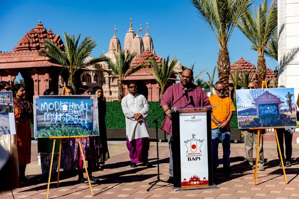 Mehul Patel, a volunteer with BAPS Shri Swaminarayan Mandir, a Hindu temple in Chino Hills, Calif., speaks during a rally for unity and peace on Sunday, March 9, 2025, after the temple was desecrated with graffiti March 7, 2025. (BAPS Swaminarayan Sanstha via AP)