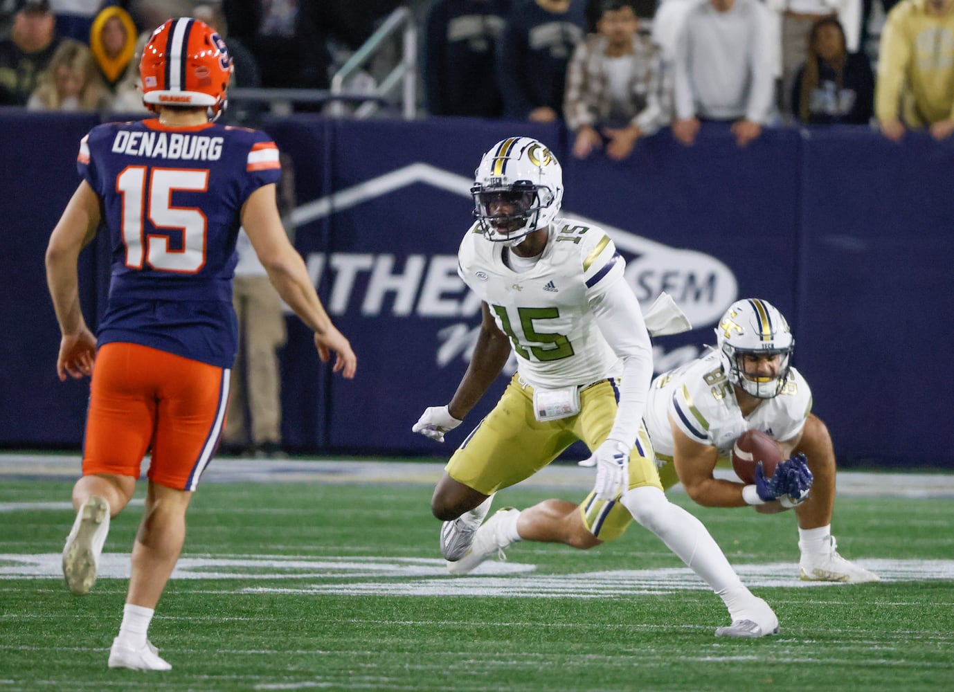 Georgia Tech Yellow Jackets tight end Billy Ward (85) returns a squib kick by Syracuse Orange kicker Brady Denaburg (15) with blocking from Sirad Bryant (15) during the second half of an NCAA college football game between Georgia Tech and Syracuse in Atlanta on Saturday, Nov. 18, 2023.  Georgia Tech won, 31 - 22. (Bob Andres for the Atlanta Journal Constitution)