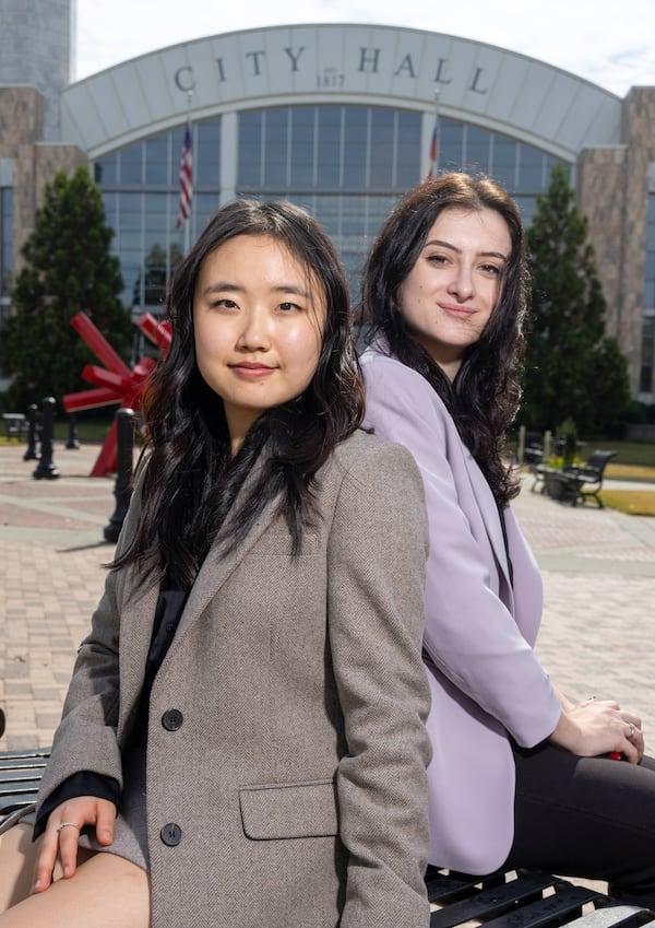 Portrait of Suann Kim & Nela Vintrlikova,
founders of SUNE Translate Inc., at Suwanee Town Center Park. For the Everyday Heroes holiday package. PHIL SKINNER FOR THE ATLANTA JOURNAL-CONSTITUTION