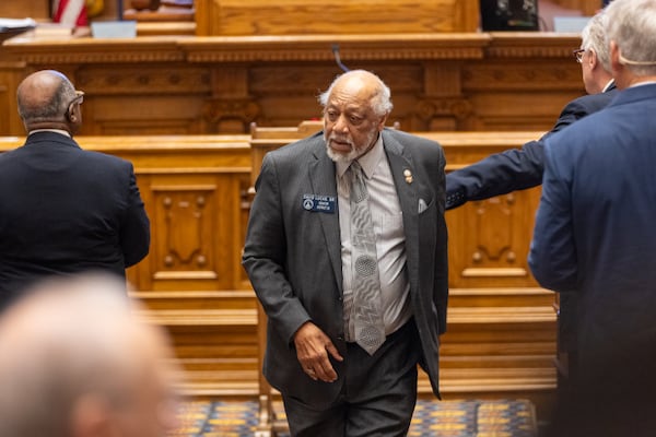 State Sen. David Lucas, D-Macon, leaves the podium after being recognized for serving in his 50th session on the first day of the legislative session at the Senate in the Capitol in Atlanta on Monday, January 13, 2025. (Arvin Temkar / AJC)