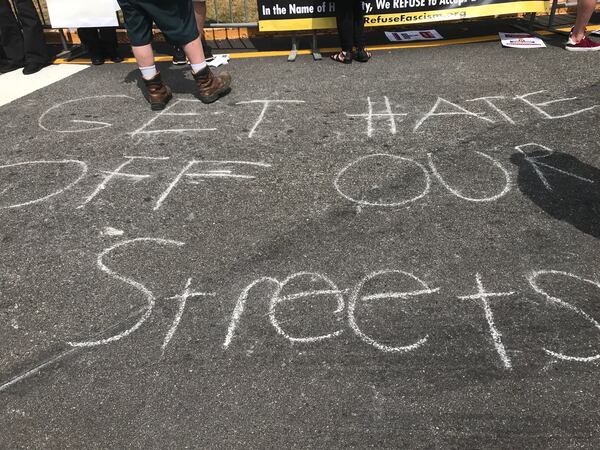 "Get hate off our streets" was one of several messages written by Dahlonega residents last night in advance of the rally. (Photo: Rosalind Bentley/AJC)