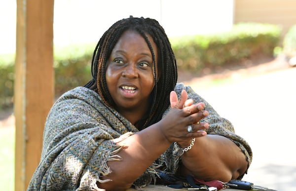 July 22, 2021 Austell - Monica DeLancy, founder of We Thrive in Riverside Renters Association, speaks with other residents and community stakeholders outside The Thrive Resource Center at the Kingsley Village Apartments in Austell on Thursday, July 22, 2021. For the past few months, a group of single mothers in Cobb County has been advocating that the county give families more rental assistance or implement a countywide moratorium on evictions to ensure no families are displaced if they canÕt pay rent. (Hyosub Shin / Hyosub.Shin@ajc.com)