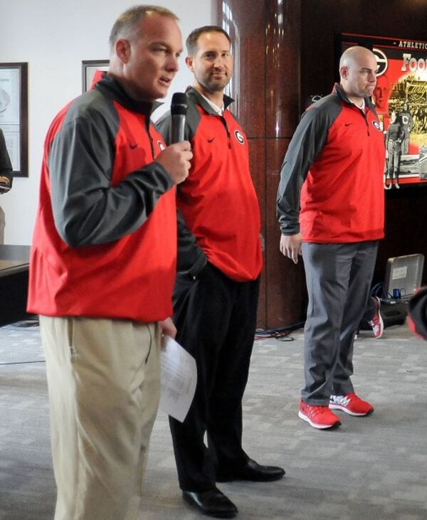 Mark Richt and his new high-salaried assistants on Signing Day. (Sean Taylor/University of Georgia)