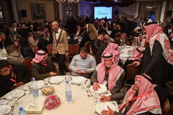 Participants in Syria's national dialogue conference gather at the Dama Rose hotel in Damascus, Syria, Monday Feb. 24, 2025. (AP Photo/Omar Albam)