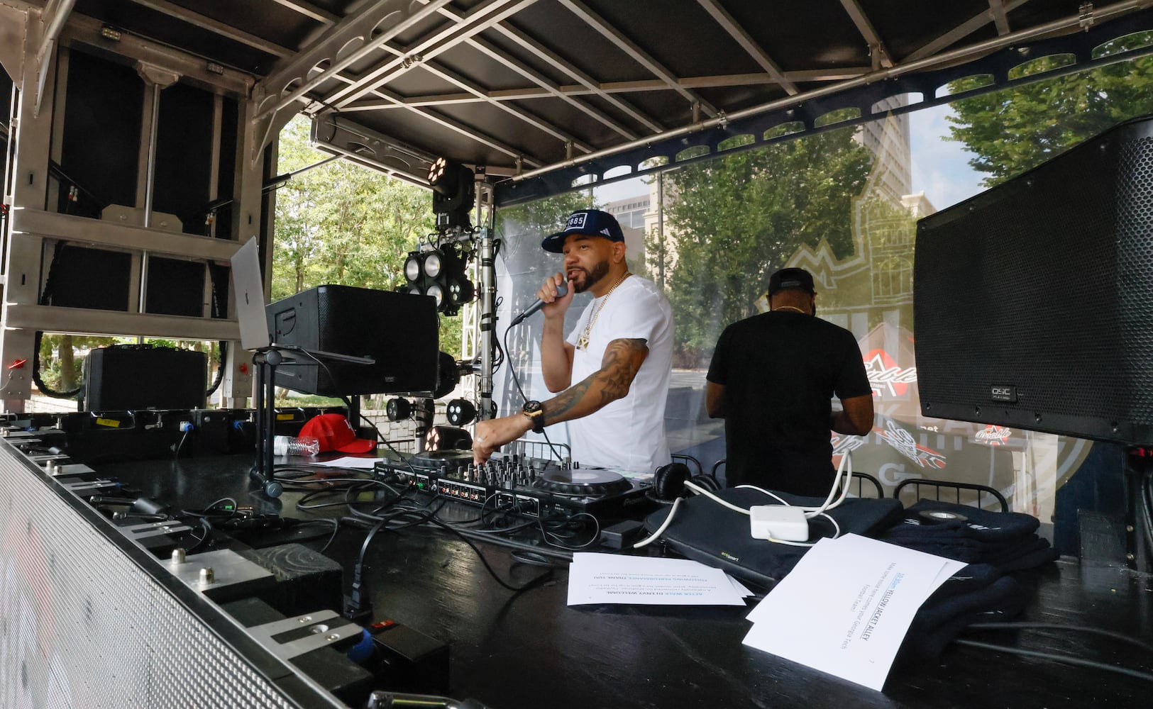 DJ Envy held the first pregame concert at Georgia Tech’s new "Helluva Block Party".  North Avenue was closed before the football game vs South Carolina State for the event in Atlanta on Saturday, September 9, 2023.   (Bob Andres for the Atlanta Journal Constitution)