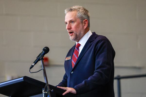 Harmony Elementary Principal Jonathan Day welcomes parents, students and staff to Harmony Elementary School's celebration in Duluth on Sunday, January 21, 2024. (Photo: Miguel Martinez /miguel.martinezjimenez@ajc.com)