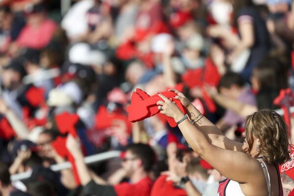 Atlanta Braves fans do the tomahawk chop during the season opener against the Philadelphia Phillies on March 29, 2018, at SunTrust Park in Cobb County. ALYSSA POINTER/ALYSSA.POINTER@AJC.COM