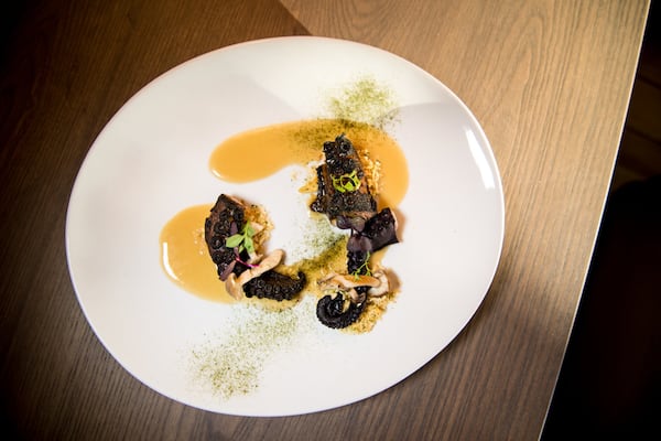 Noona Grilled Octopus with glazed shimeji mushrooms, fermented soybean, panko, ssamjang, seaweed powder, and smoked black sesame. CONTRIBUTED BY MIA YAKEL