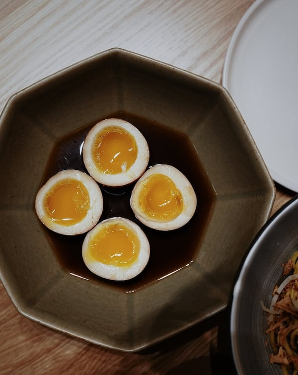 Soft-boiled tea eggs, an elevated version of a common Taiwanese snack, are the surprising showstoppers of Lucky Star's menu. (Courtesy of Ching Yao Wang/Lucky Star)