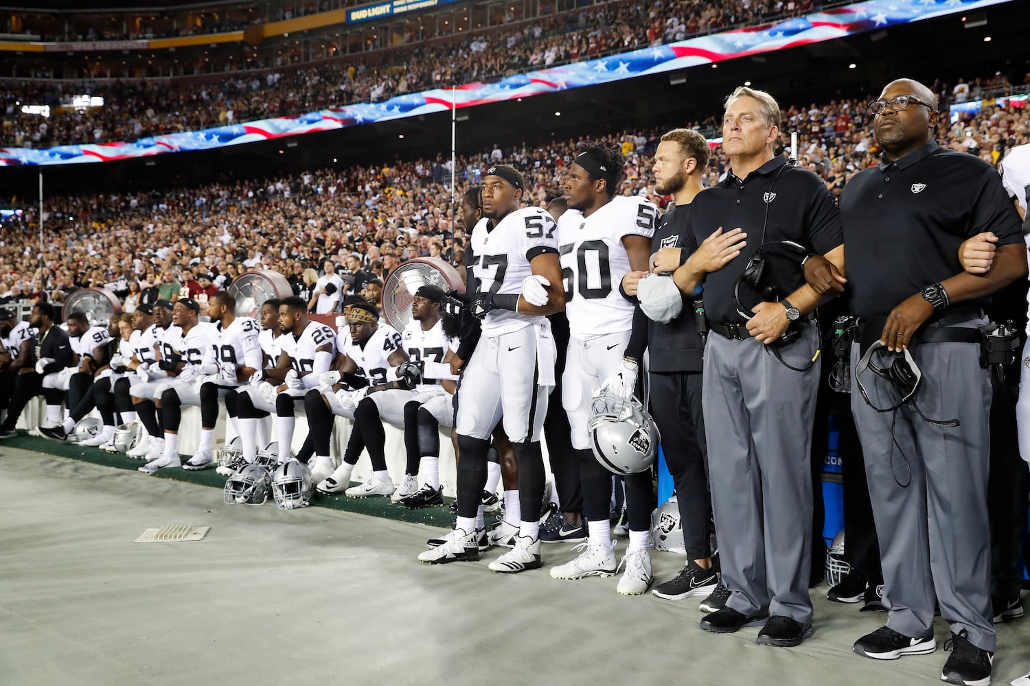 Photos: Falcons, other NFL teams show solidarity during National Anthem