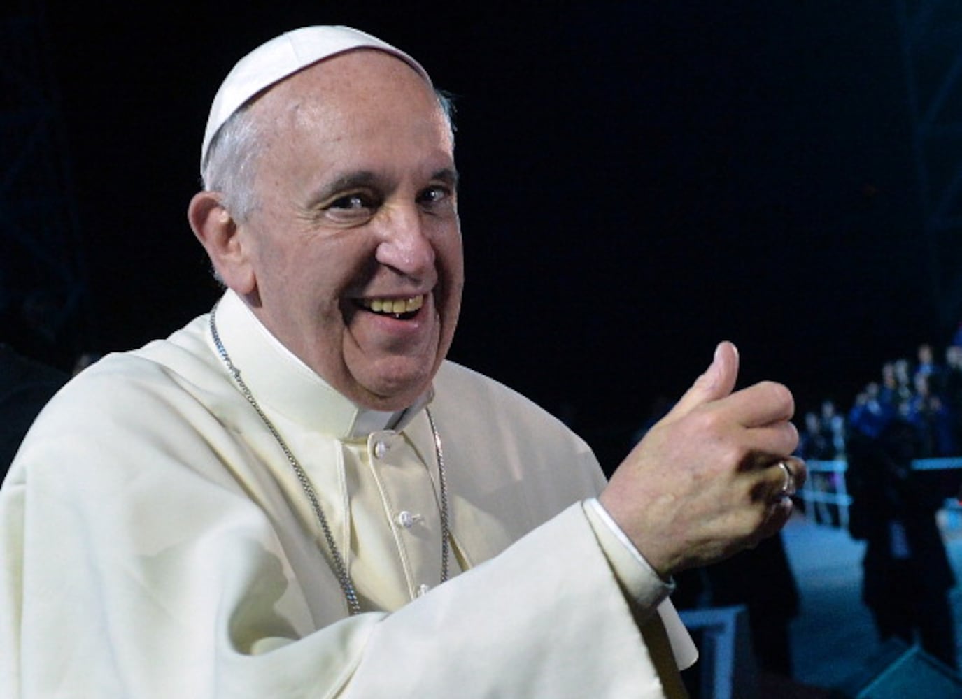 Pope Francis gestures upon arrival for a prayer vigil (July 27, 2013)