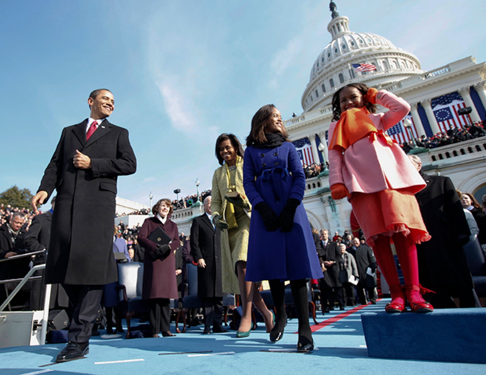 U.S. President-elect Barack Obama, left, arrives to take the oath of office with his wife Michelle, and daughters Malia, and Sasha, right, on Jan. 20, 2009.