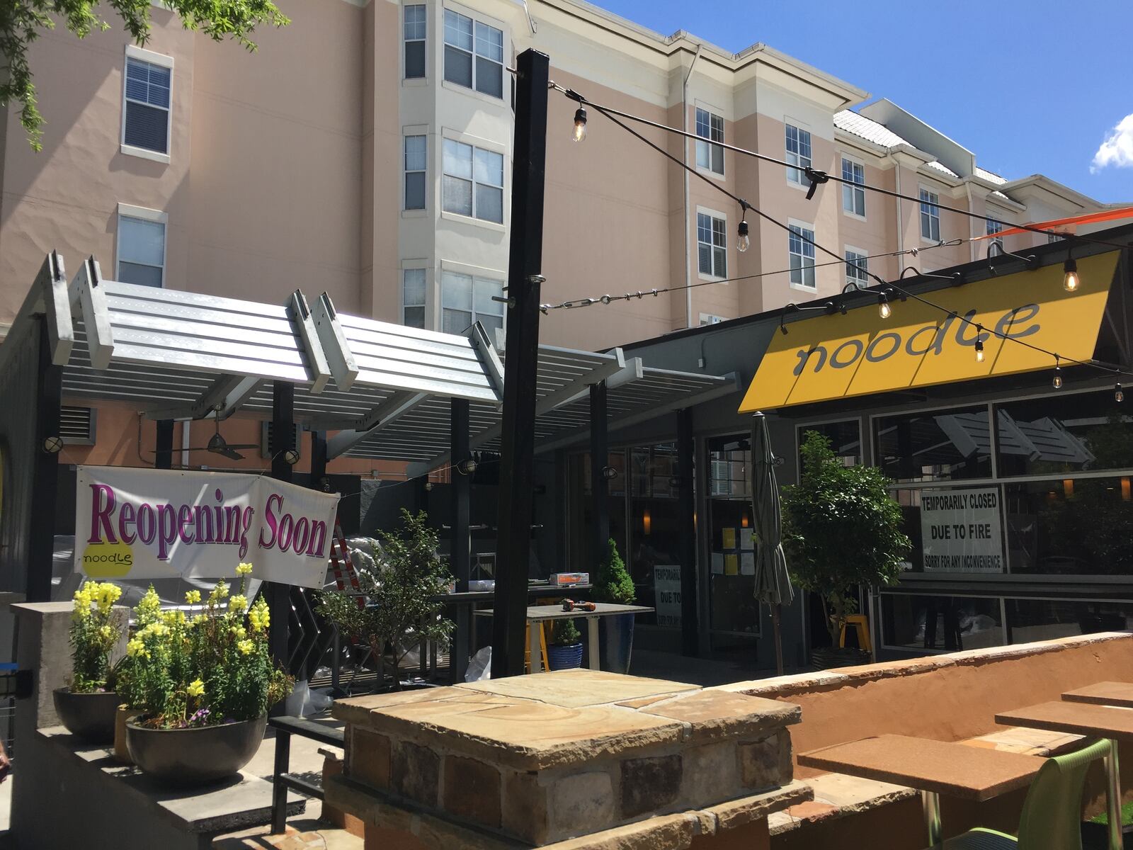 Noodle hopes to reopen soon. In the meantime, a large signs states the restaurant is temporarily closed due to damage from the fire. (Photo: J.D. CAPELOUTO/JDCAPELOUTO@AJC.COM)