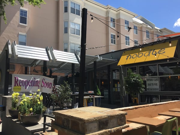 Noodle hopes to reopen soon. In the meantime, a large signs states the restaurant is temporarily closed due to damage from the fire. (Photo: J.D. CAPELOUTO/JDCAPELOUTO@AJC.COM)