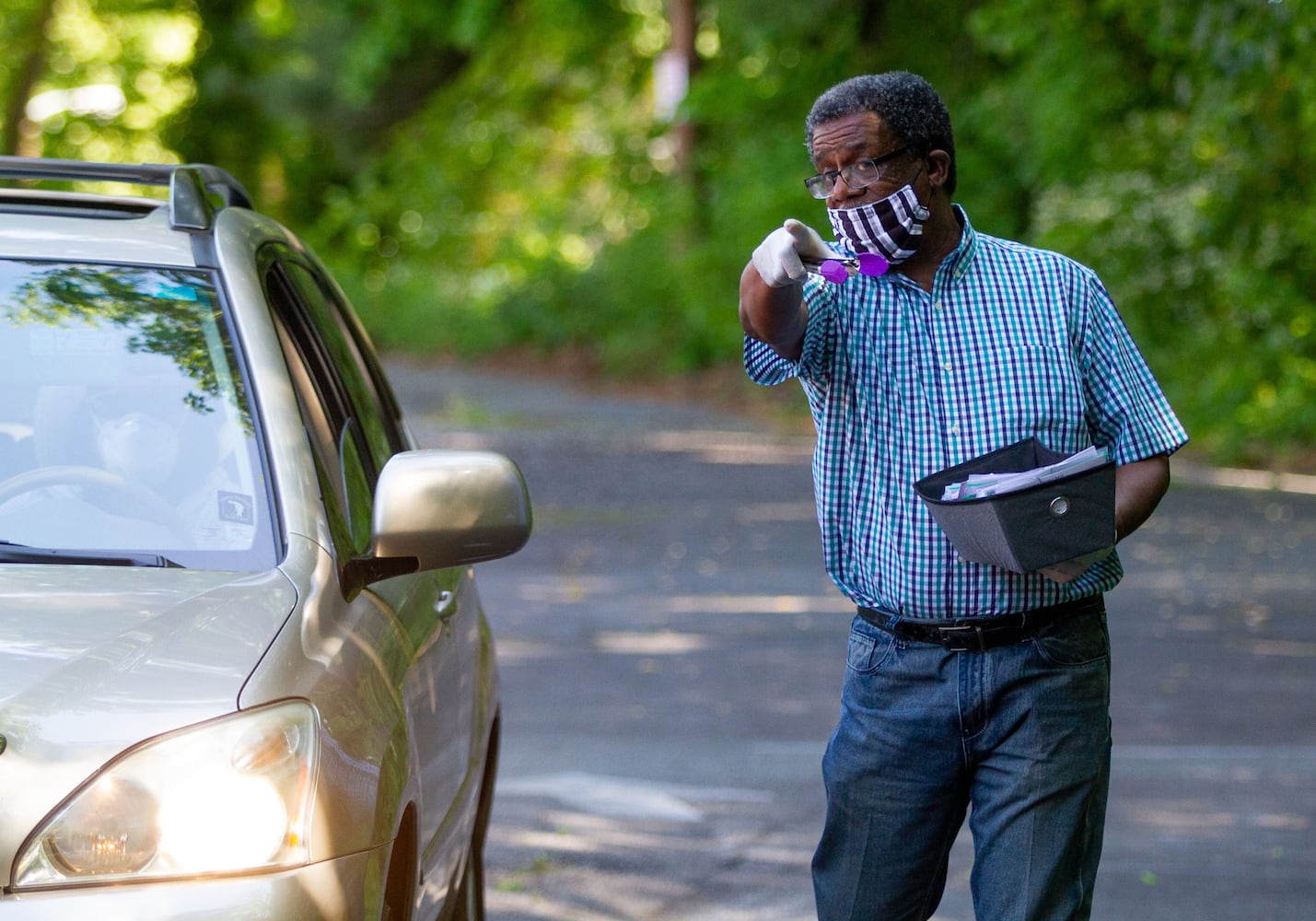 PHOTOS: Drive-thru service at New Beginning Full Gospel Baptist Church