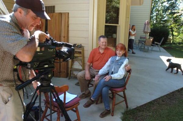 Director of photography Bryan Duggan gets ready to record Jim and Marcia Sasser for Cesar Millan's "The Dog Whisperer" show in 2006. When asked after the session if she thought Millan was rough on her pets, Marcia Sasser responded. "No, never. In fact, I thought the exact opposite. I was thrilled there was someone who could help us without being mean to our dogs."