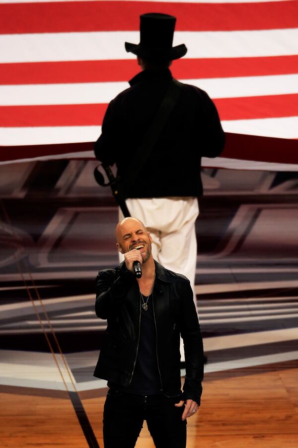 ARLINGTON, TX - APRIL 05: Chris Daughtry performs the national anthem prior to the NCAA Men's Final Four Semifinal between the Connecticut Huskies and the Florida Gators at AT&amp;T Stadium on April 5, 2014 in Arlington, Texas. (Photo by Jamie Squire/Getty Images) ARLINGTON, TX - APRIL 05: Chris Daughtry performs the national anthem prior to the NCAA Men's Final Four Semifinal between the Connecticut Huskies and the Florida Gators at AT&amp;T Stadium on April 5, 2014 in Arlington, Texas. (Photo by Jamie Squire/Getty Images)