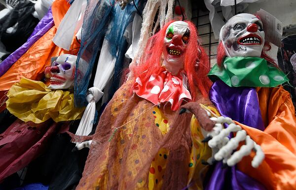 Clown paraphernalia hangs in a Halloween store in Miami, Florida, on October 27, 2016. (RHONA WISE/AFP/Getty Images)