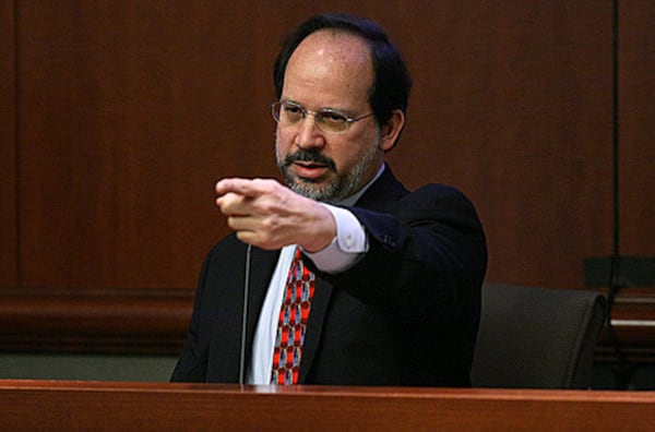 Attorney Richard Robbins points with his finger as Brian Nichols did with his gun while testifying in the murder trial.