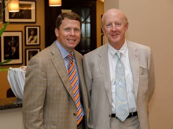 Andy Isakson (right) with his business partner and nephew, Kevin Isakson, at the opening of Pebblebrook at Park Springs in Stone Mountain in July 2017. CONTRIBUTED BY BEN ROSE PHOTOGRAPHY