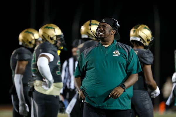 Langston Hughes head coach Daniel “Boone” Williams is shown on the sideline during their game against Rome in the Class 6A semi-final at Lakewood Stadium, Friday, December 2, 2022, in Atlanta. Jason Getz / Jason.Getz@ajc.com)
