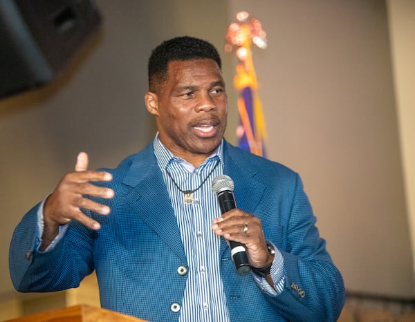 Herschel Walker campaigns at Mojitos Bistro in Norcross on September 26, 2022  in his bid for a U.S. Senate seat. (Jenni Girtman for The Atlanta Journal-Constitution)