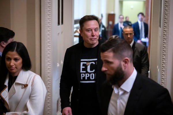 Elon Musk leaves after meeting with Senate Republicans, at the Capitol in Washington, Wednesday, March 5, 2025. (AP Photo/Ben Curtis)