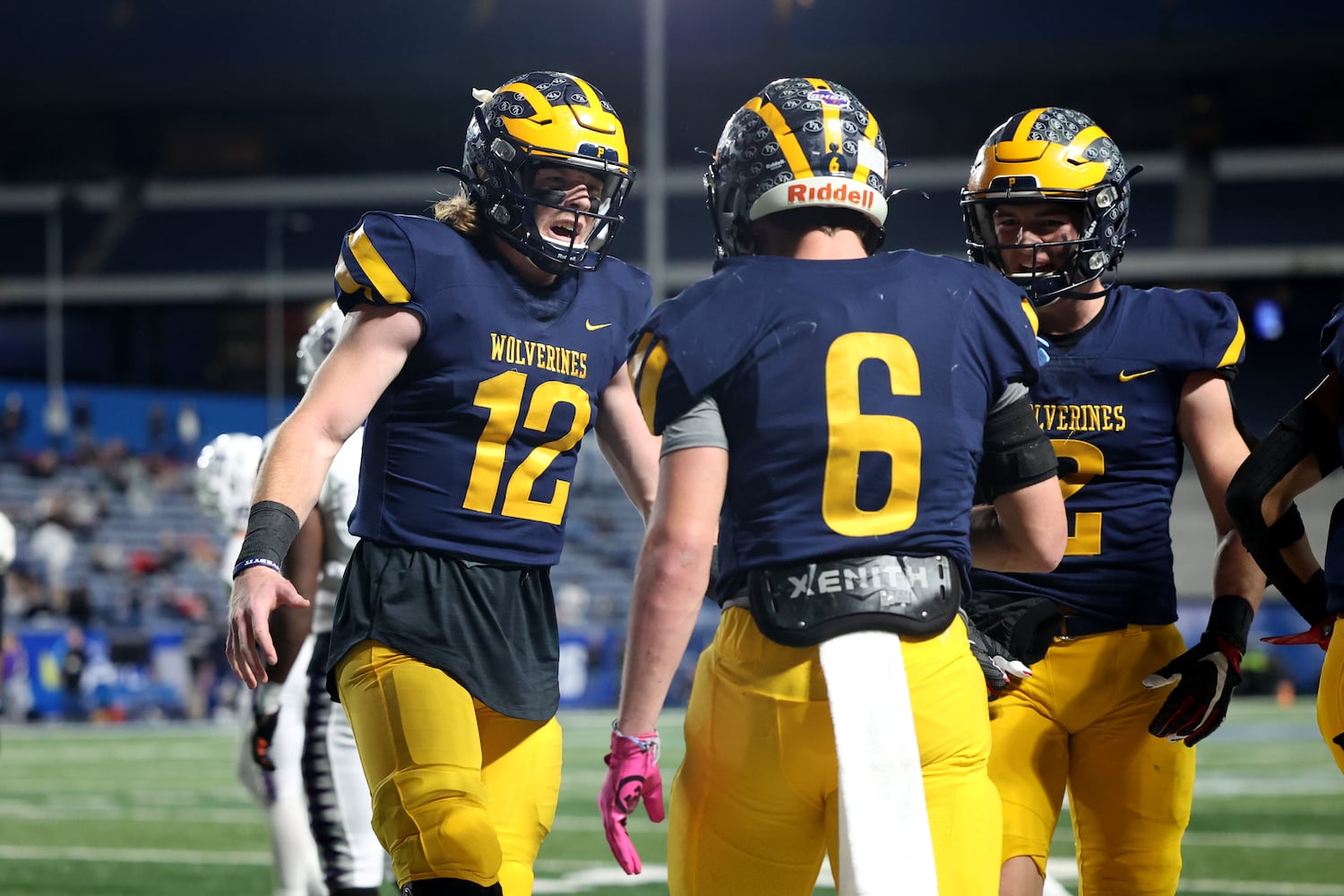 Prince Avenue Christian quarterback Brock Vandagriff (12) celebrates with wide receiver Landon Owens (6) after OwensÕ touchdown run in the second half of their 41-21 win against Trinity Christian during the Class 1A Private championship at Center Parc Stadium Monday, December 28, 2020 in Atlanta, Ga.. JASON GETZ FOR THE ATLANTA JOURNAL-CONSTITUTION