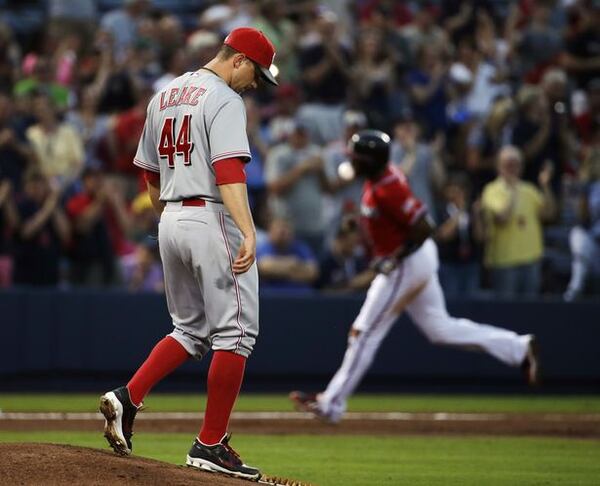 Reds pitcher Mike Leake gave up three homers before he'd recorded his ninth out in Saturday's 4-1 Braves win. And it could've been four homers if Freddie Freeman didn't have won robbed by Ryan Ludwick's catch above the left-field fence.