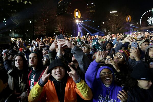  January 8, 2018 - ATLANTA: The crowd getting hyped for Kendrick Lamar to hit the stage to perform for the halftime College Football Playoff Championship game between Georgia and Alabama at Centennial Olympic Park on Monday, January 8, 2018. (Akili-Casundria Ramsess/Eye of Ramsess Media)