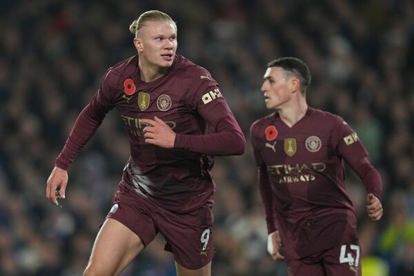 Manchester City's Erling Haaland celebrates after scoring during the English Premier League soccer match between Brighton and Manchester City at Falmer Stadium in Brighton, England, Saturday, Nov. 9, 2024. (AP Photo/Alastair Grant)