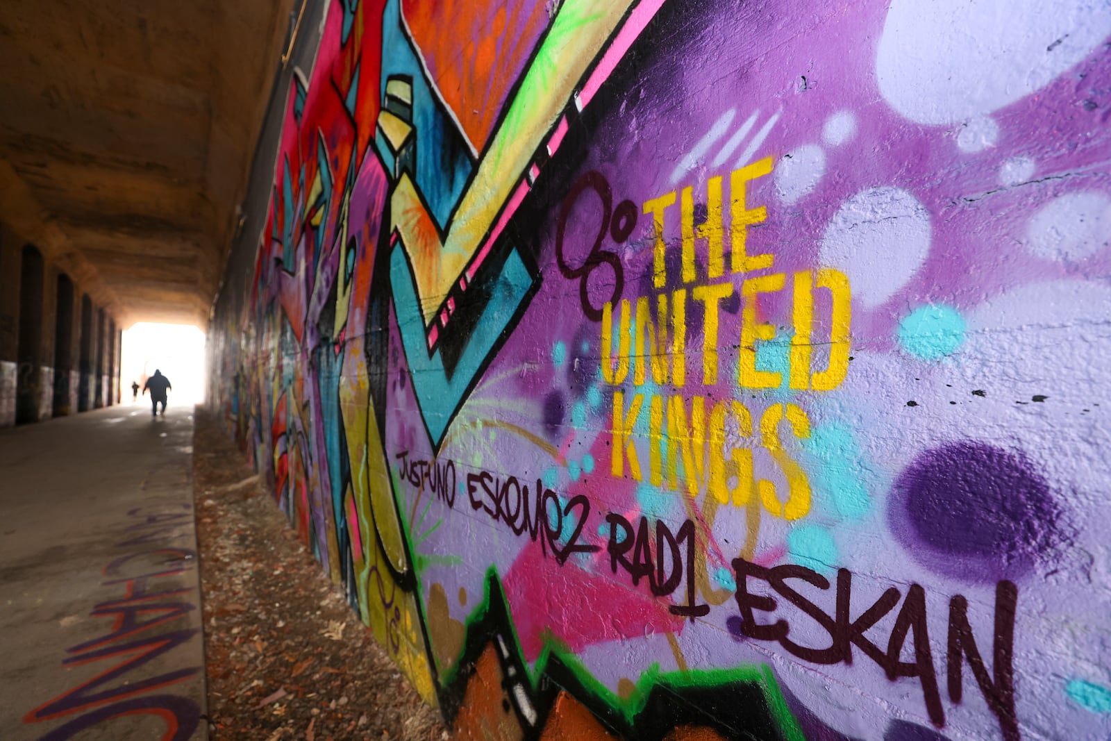 A work of the United Kings on the Beltline’s West Trail under the Lee Street tunnel. (AJC 2024) 