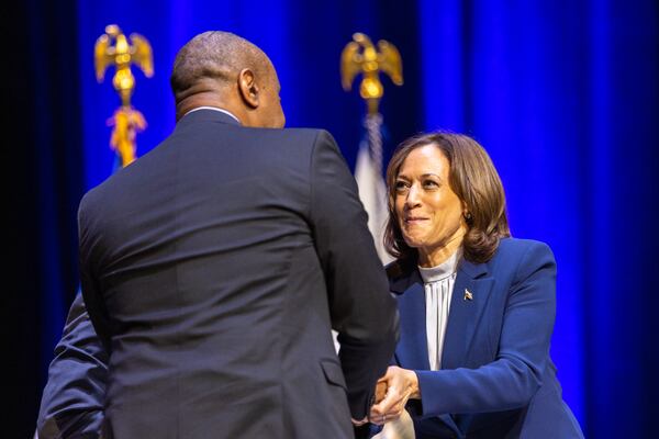 Vice President Kamala Harris shakes hands with University of Georgia professor Marshall Shepherd following their discussion on climate change Wednesday at Georgia Tech. (Arvin Temkar / arvin.temkar@ajc.com)