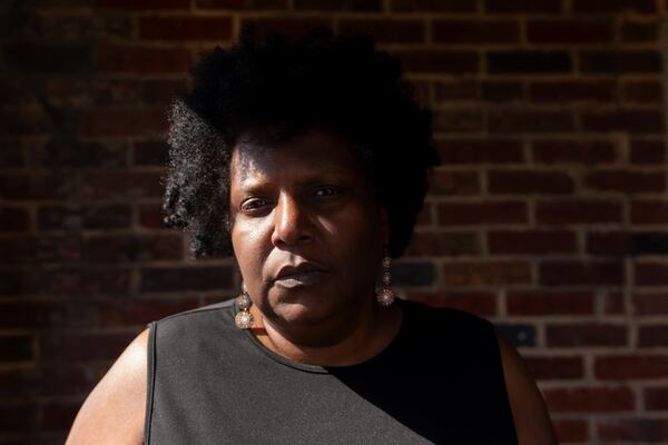 Nalisha Gibbs poses for a portrait at her home, Wednesday, March 12, 2025, in Baltimore. (AP Photo/Stephanie Scarbrough)