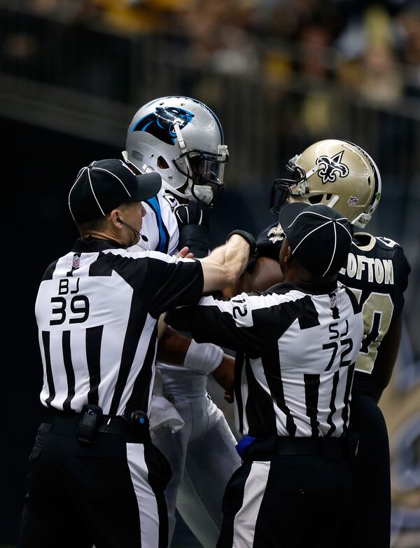 NEW ORLEANS, LA - DECEMBER 07: Cam Newton #1 of the Carolina Panthers and Curtis Lofton #50 of the New Orleans Saints get into a fight after a touchdown during the first quarter at Mercedes-Benz Superdome on December 7, 2014 in New Orleans, Louisiana. (Photo by Sean Gardner/Getty Images) NEW ORLEANS, LA - DECEMBER 07: Cam Newton #1 of the Carolina Panthers and Curtis Lofton #50 of the New Orleans Saints get into a fight after a touchdown during the first quarter at Mercedes-Benz Superdome on December 7, 2014 in New Orleans, Louisiana. (Photo by Sean Gardner/Getty Images)