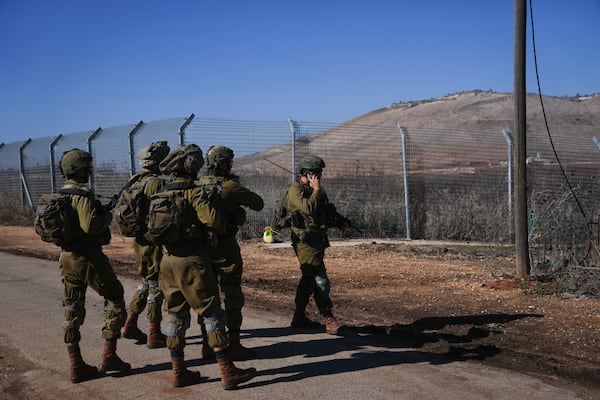 Israeli soldiers patrol the perimeter of the agricultural settlement of Avivim, next to the Lebanese border in upper Galilee, Israel, Tuesday Dec. 2, 2024. (AP Photo/Ohad Zwigenberg)