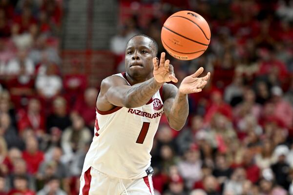 Arkansas guard Johnell Davis (1) passes the ball against Lipscomb during the second half of an NCAA college basketball game Wednesday, Nov. 6, 2024, in Fayetteville, Ark. (AP Photo/Michael Woods)