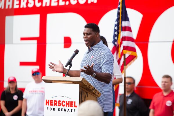 Republican U.S. Senate candidate Herschel Walker speaks during a United Georgia Bus Stop rally on Sunday, November 6, 2022, in Hiram. CHRISTINA MATACOTTA FOR THE ATLANTA JOURNAL-CONSTITUTION.