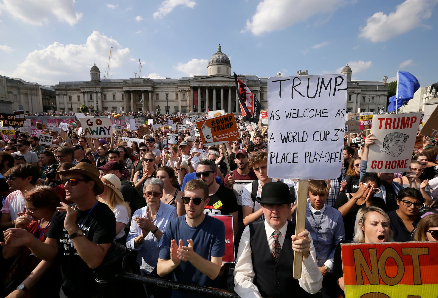 Photos: Protesters greet Trump during UK visit