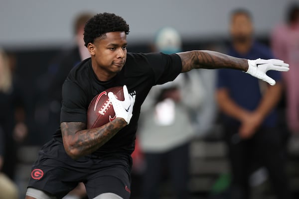 Georgia's Dominic Lovett runs a drill during the school's NFL Pro Day, Wednesday, March, 12, 2025, in Athens, Ga. (AP Photo/Colin Hubbard)