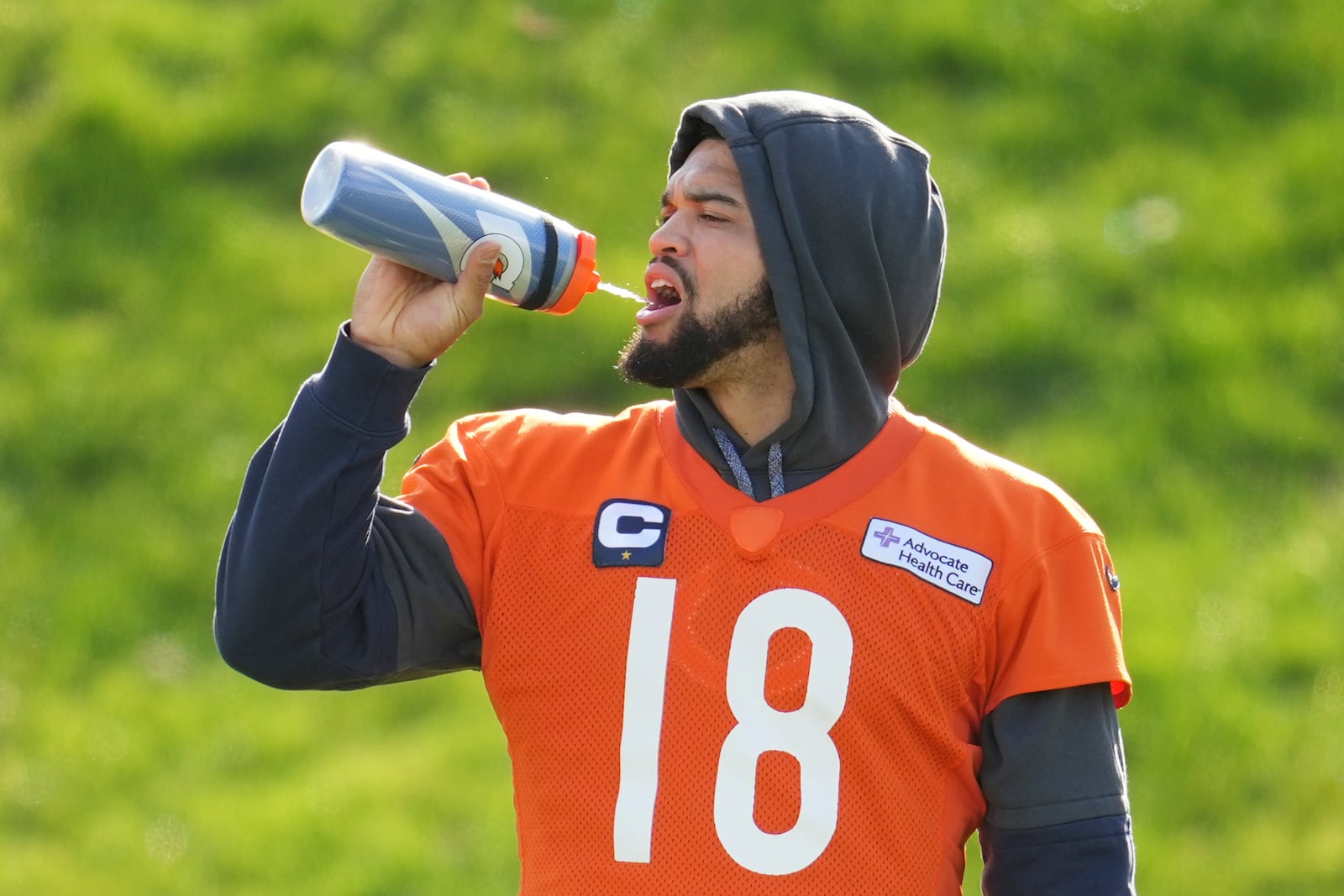 Chicago Bears quarterback Caleb Williams (18) participates in a NFL football training session in Ware, England, Friday, Oct. 11, 2024, ahead of the game against the Jacksonville Jaguars at the Tottenham Hotspur stadium on Sunday. (AP Photo/Kin Cheung)