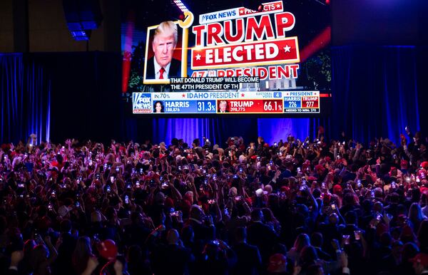 A crowd of supporters reacts after Fox News announced Republican presidential nominee Donald Trump as the winner of his presidential race against Kamala Harris during his election night party at the Palm Beach County Convention Center on Tuesday, Nov. 5, 2024, in West Palm Beach, Florida. (Matias J. Ocner/Miami Herald/TNS)