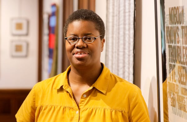 Artist Jerushia Graham poses for a portrait with her new exhibit, “Freedom Isn’t Free,” at Callanwolde Fine Arts Center in Atlanta on Tuesday, July 20, 2021. The show runs from July 15 to Sept. 2. (Christine Tannous / christine.tannous@ajc.com)