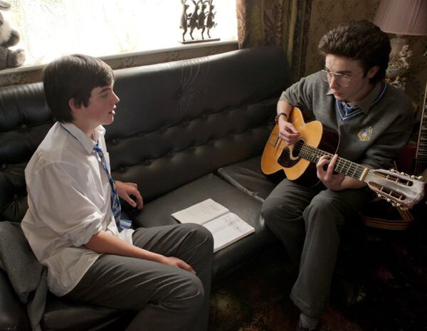 Ferdia Walsh-Peelo and Mark McKenna in "Sing Street." (Photo courtesy The Weinstein Company/TNS)